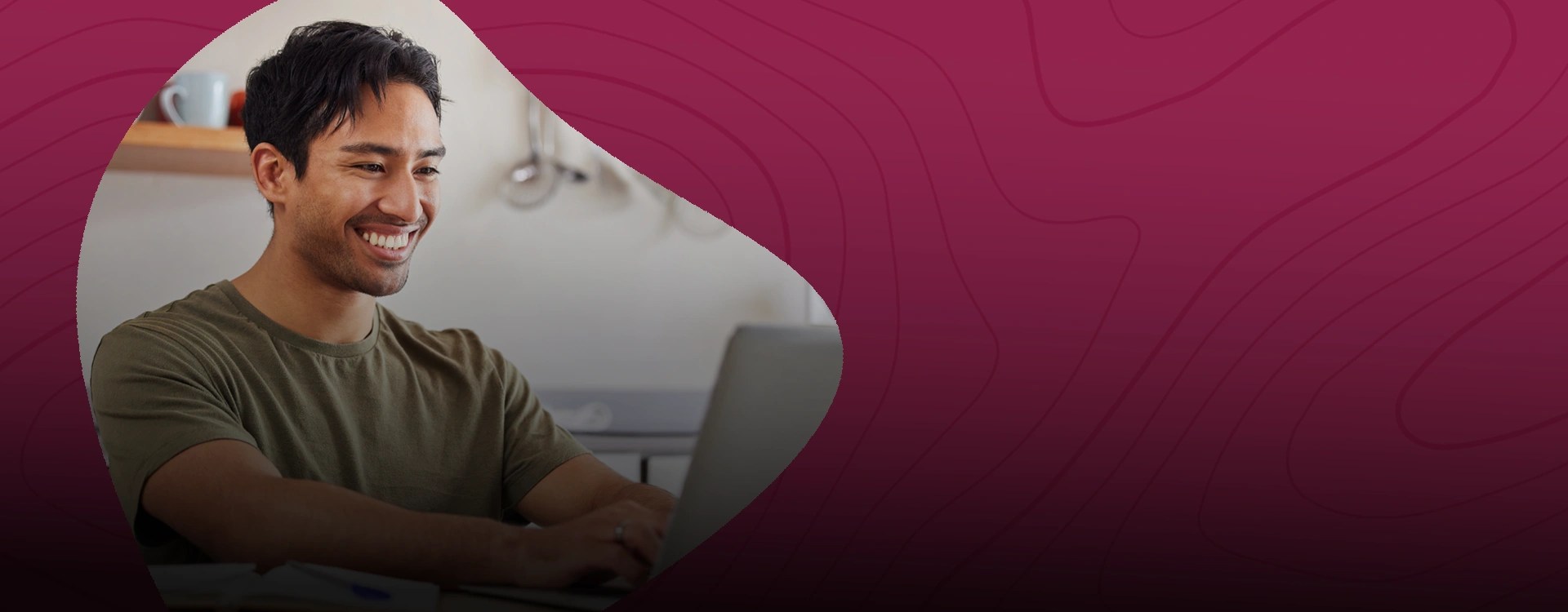 A military student uses a laptop for online college at New Mexico State University Global Campus