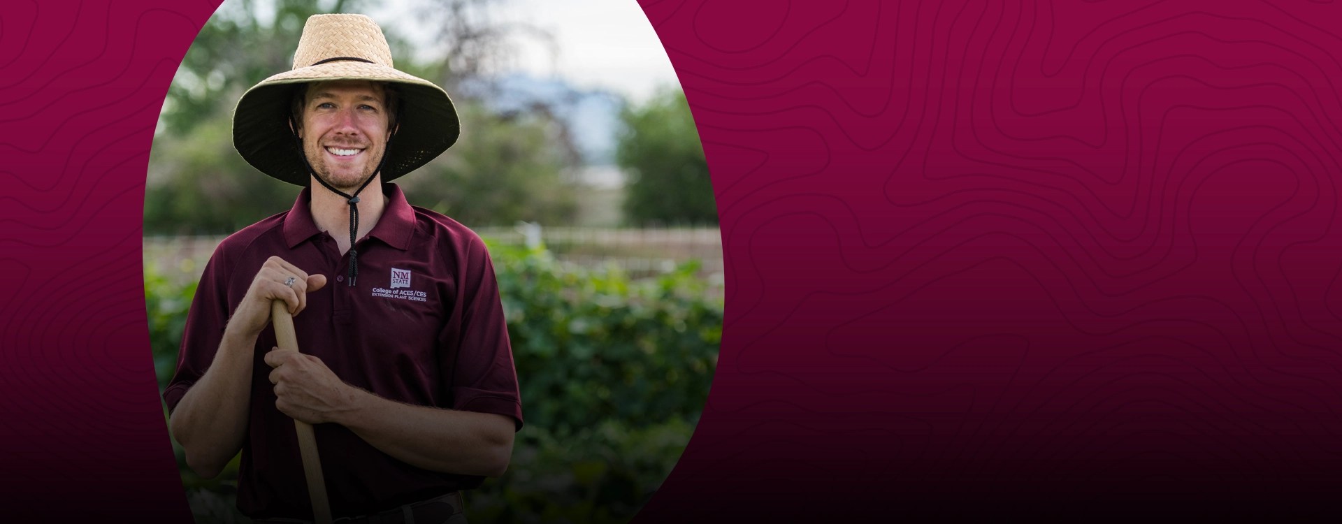 An agriculture instructor poses in a crop field — New Mexico State University Global Campus
